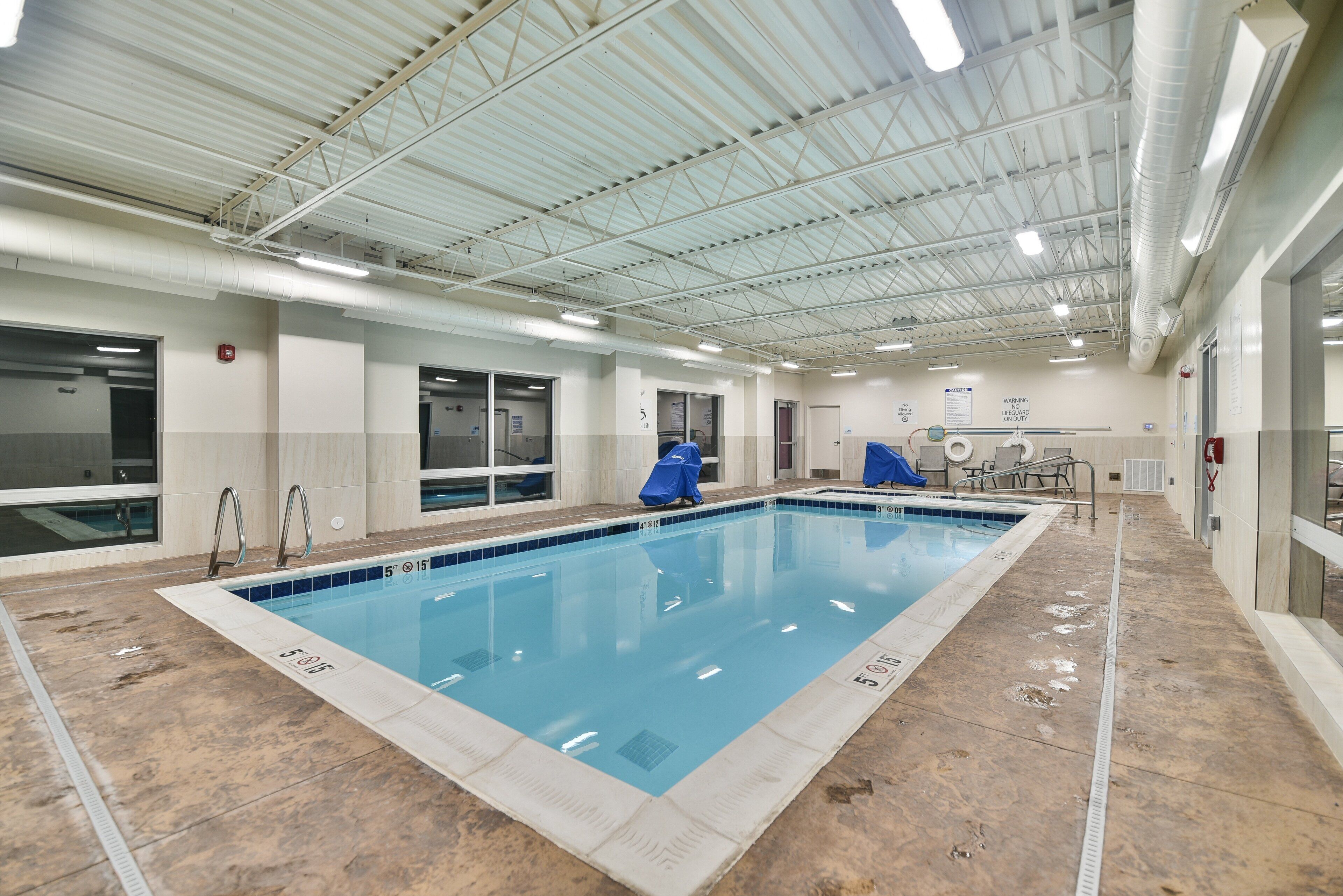 Indoor pool, open 7 AM to 11 PM, sun loungers