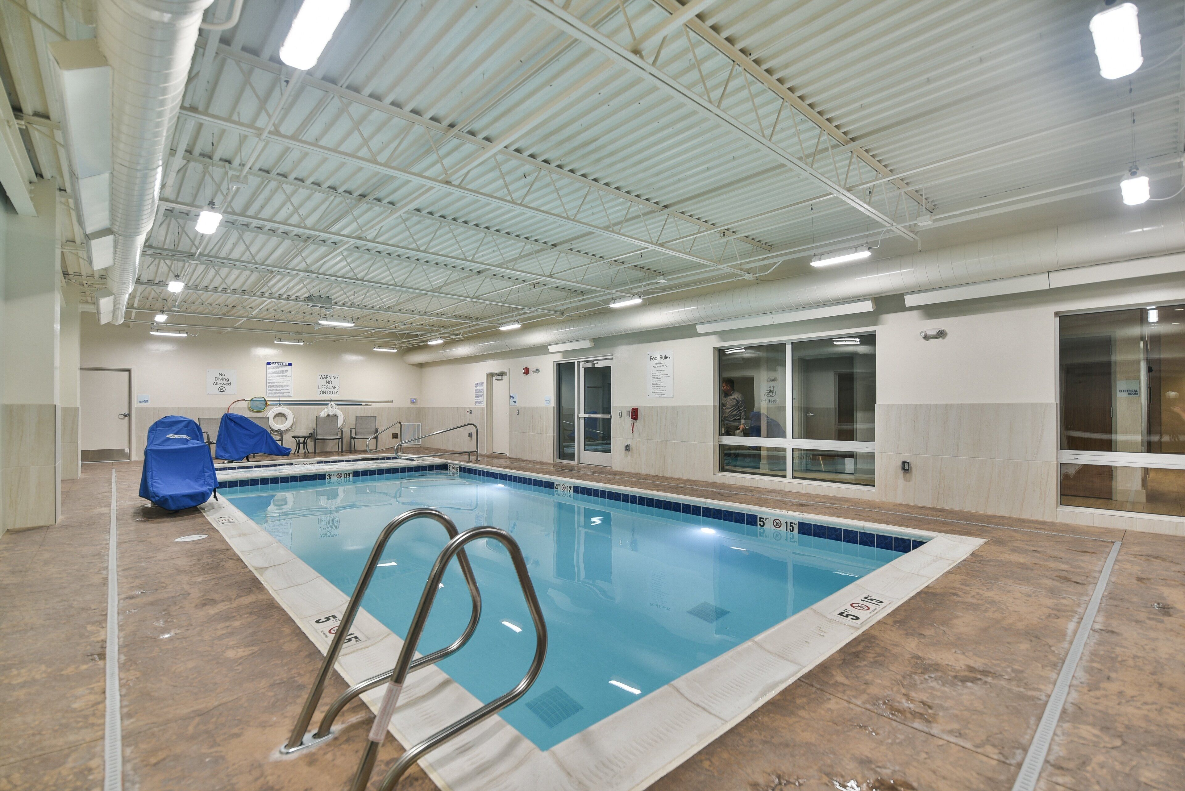 Indoor pool, open 7 AM to 11 PM, sun loungers
