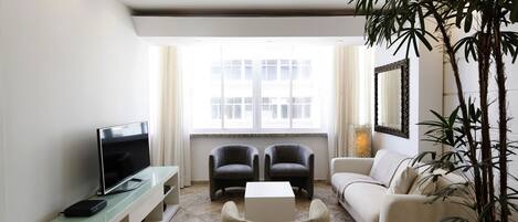 Elite Apartment, 2 Bedrooms | Living room | TV