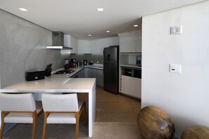 Fridge, microwave, oven, espresso maker