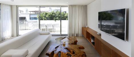 Luxury Penthouse, 3 Bedrooms | Living area | TV, iPod dock