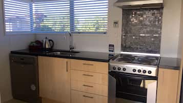 Apartment, 3 Bedrooms | Private kitchen | Full-sized fridge, microwave, oven, stovetop