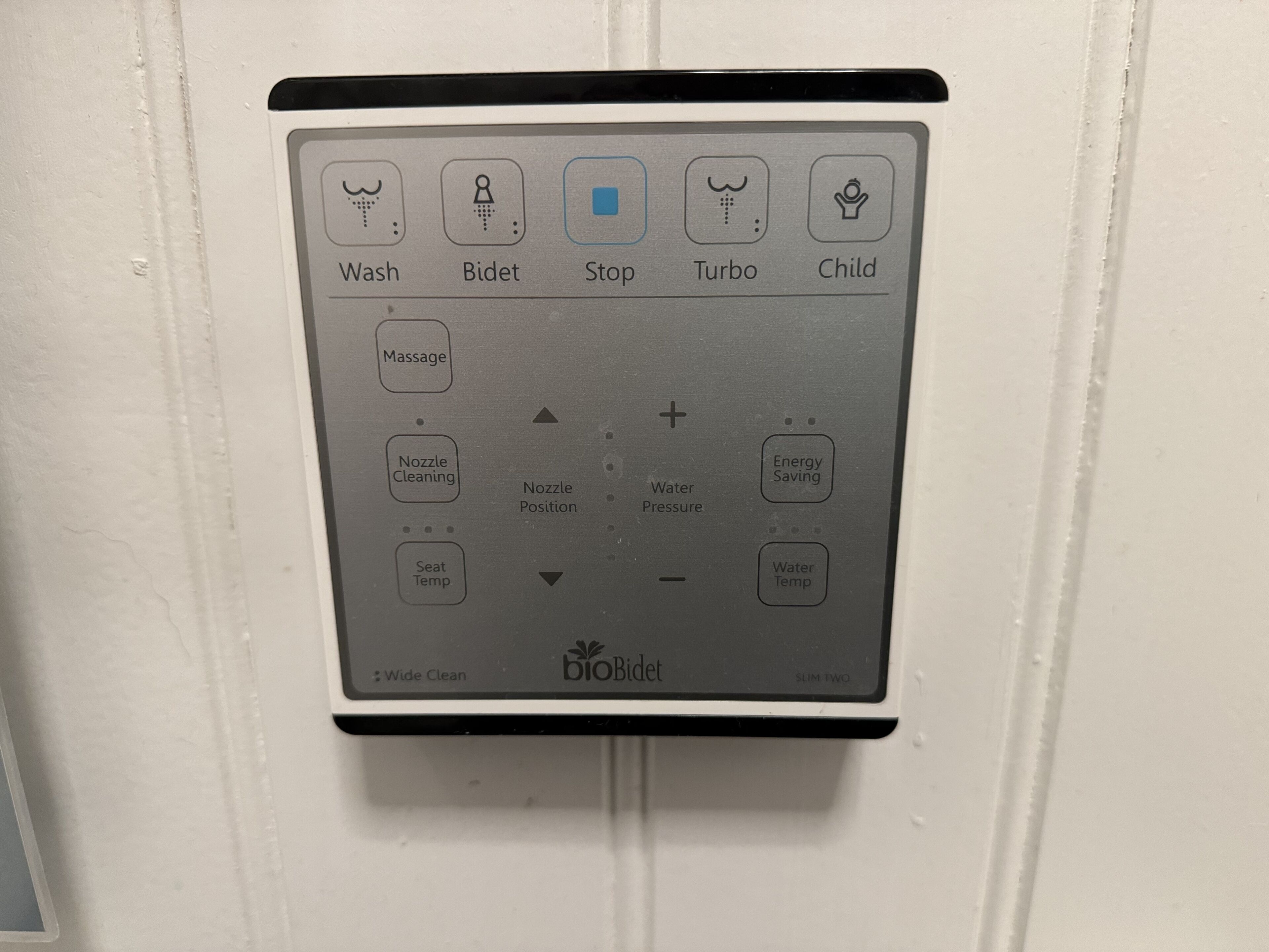 A control panel with options like Wash, Bidet, Stop, Turbo, and Child.