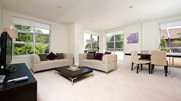 Apartment, 2 Bedrooms (Trieste 8) | Living area | Flat-screen TV