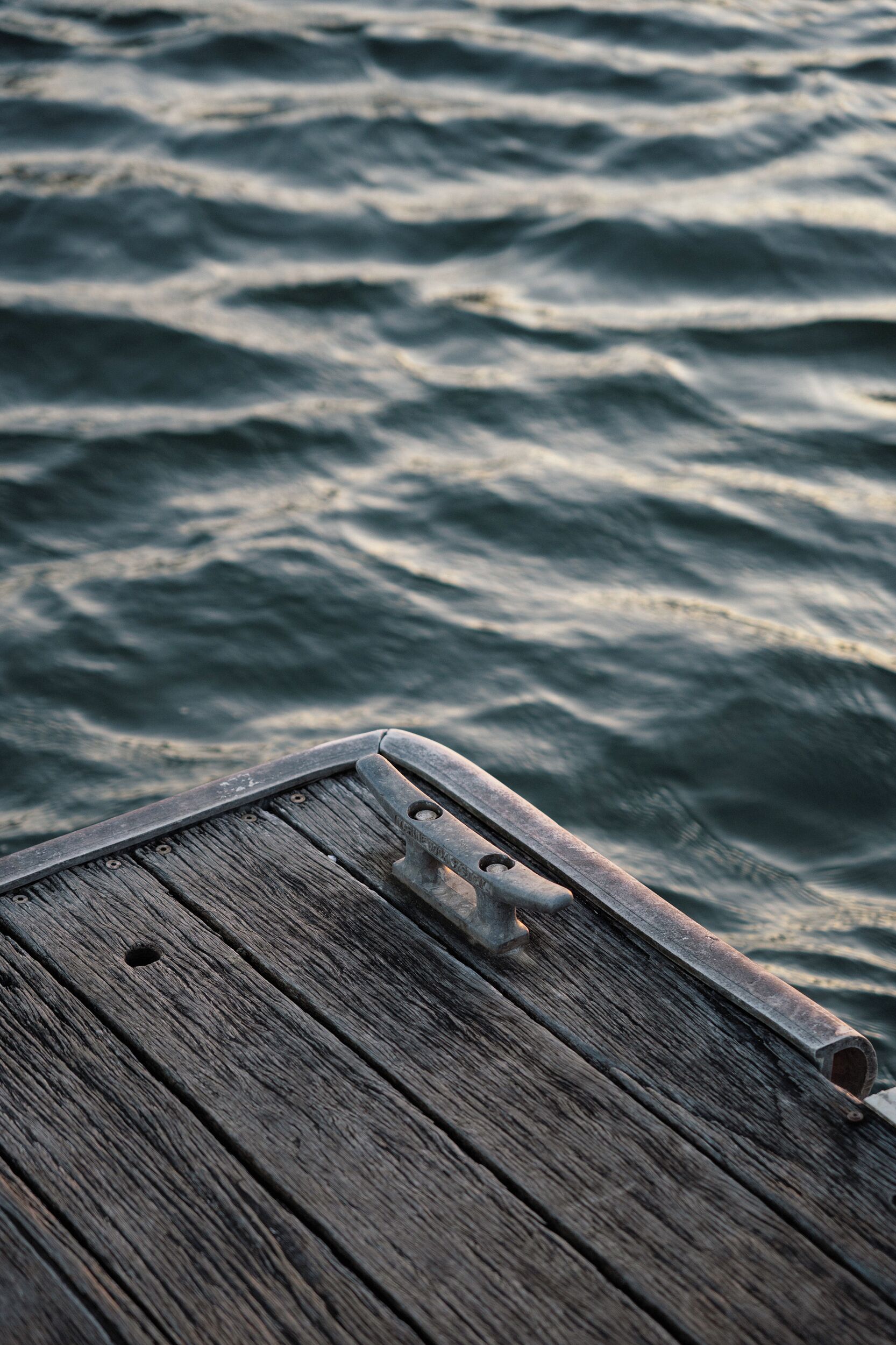 A wooden dock extending into a body of water.