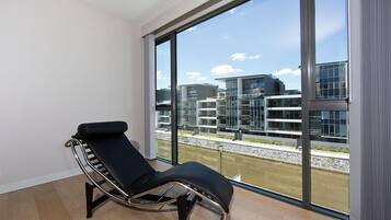 Apartment, 1 Bedroom (Aurora 14) | Living area | Flat-screen TV, DVD player