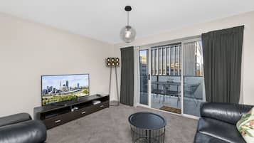 Comfort Apartment, 2 Bedrooms | Living area | LCD TV, DVD player