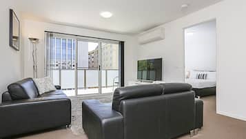 Apartment, 1 Bedroom (Braddon 13) | Living room | LCD TV, DVD player