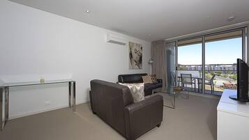 Apartment, 1 Bedroom (Aspire 45) | Living area | LCD TV, DVD player