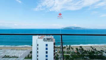 Executive 01 Bedroom Apartment with Sea View (for 04 adults) | Olohuone | LED-televisio
