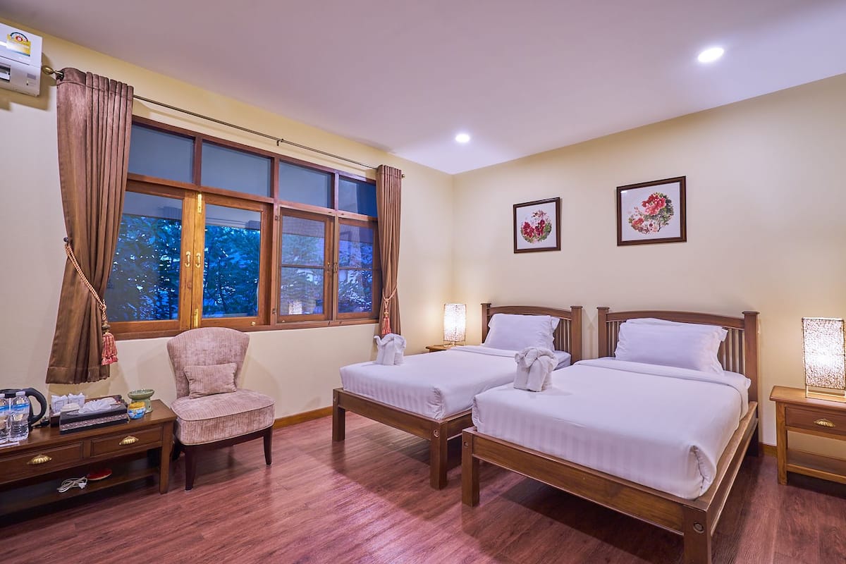 Standard Room, Multiple Beds, Courtyard View, Courtyard Area | Minibar, desk, rollaway beds (surcharge), WiFi (free)