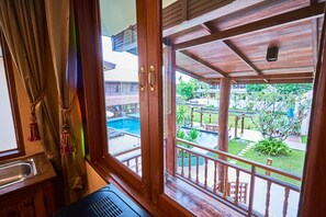 Family Suite, 1 Bedroom, Pool View, Garden Area | Bathroom | Shower, free toiletries, hair dryer, bathrobes - HueanKhamHom Resort (Chiang Mai)