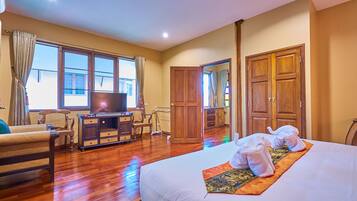 Family Suite, 1 Bedroom, Pool View, Garden Area | Bathroom | Shower, free toiletries, hair dryer, bathrobes