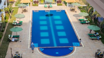 Outdoor pool, pool umbrellas, sun loungers
