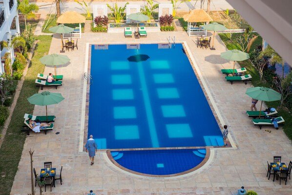 Outdoor pool, pool umbrellas, pool loungers