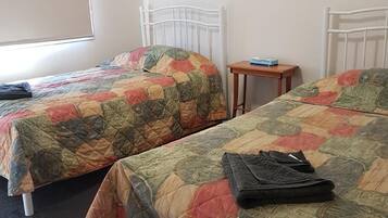 Desk, iron/ironing board, rollaway beds, bed sheets