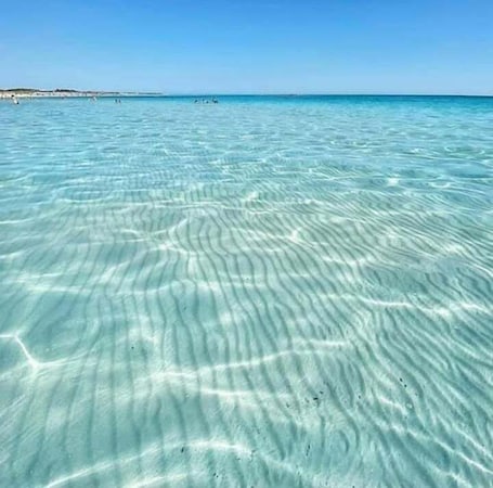 Beach nearby, white sand, beach shuttle
