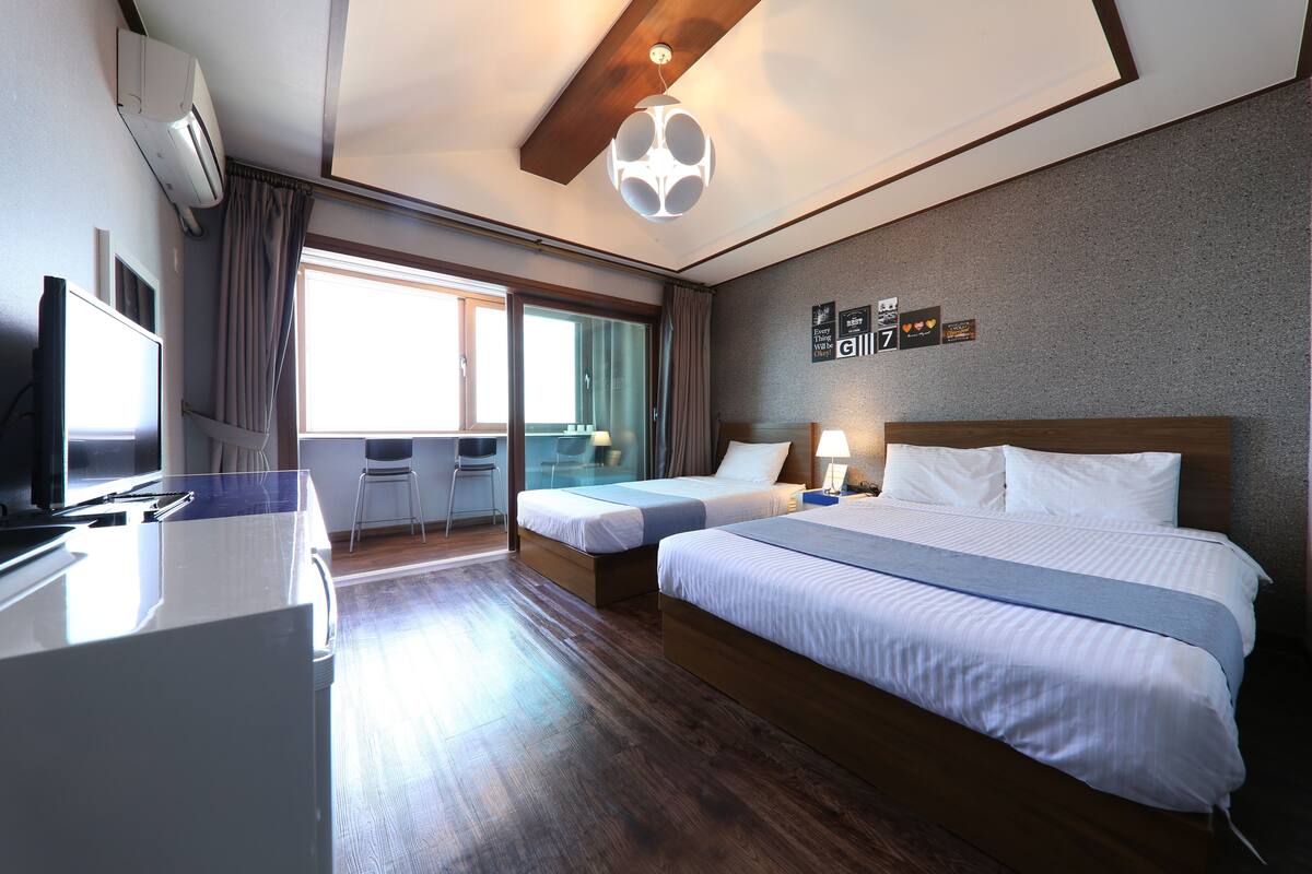 Chambre Deluxe avec lits jumeaux, 1 chambre | Système d’insonorisation, accès au Wi-Fi (inclus)