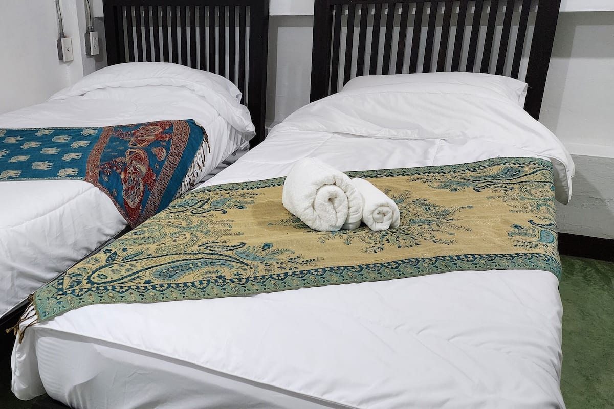 Standard Twin Room, 2 Single Beds, Non Smoking, Private Bathroom | Iron/ironing board, free WiFi, bed sheets