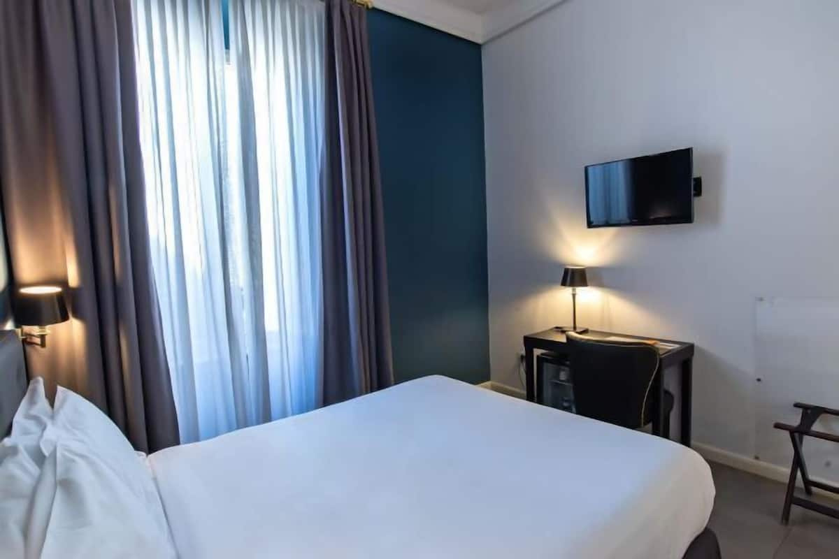 Down comforters, memory foam beds, minibar, in-room safe