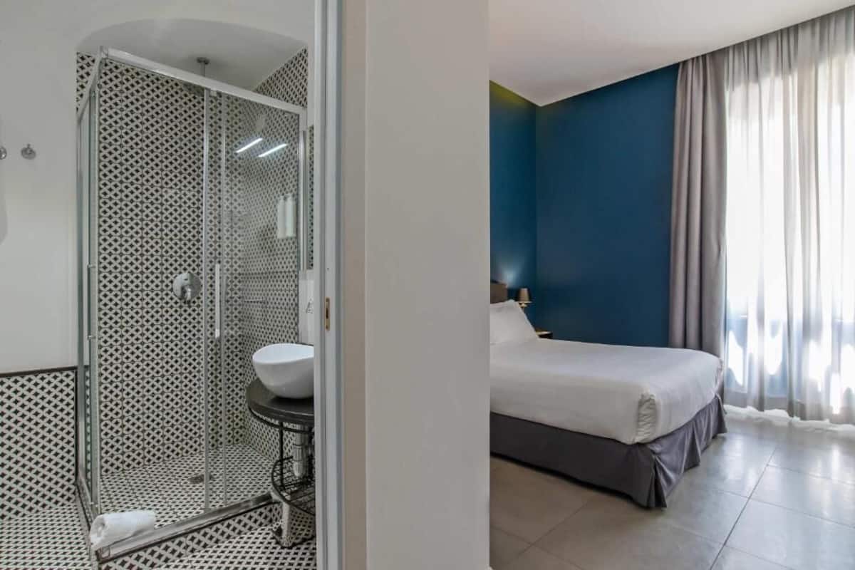 Single Room | Down comforters, memory foam beds, minibar, in-room safe