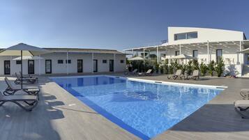 Outdoor pool, open 8:00 AM to 7:30 PM, sun loungers