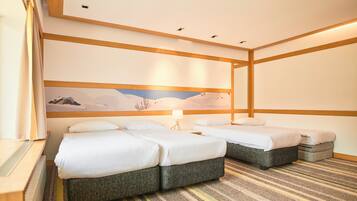A hotel room with two beds, a large painting on the wall, and a striped carpet.