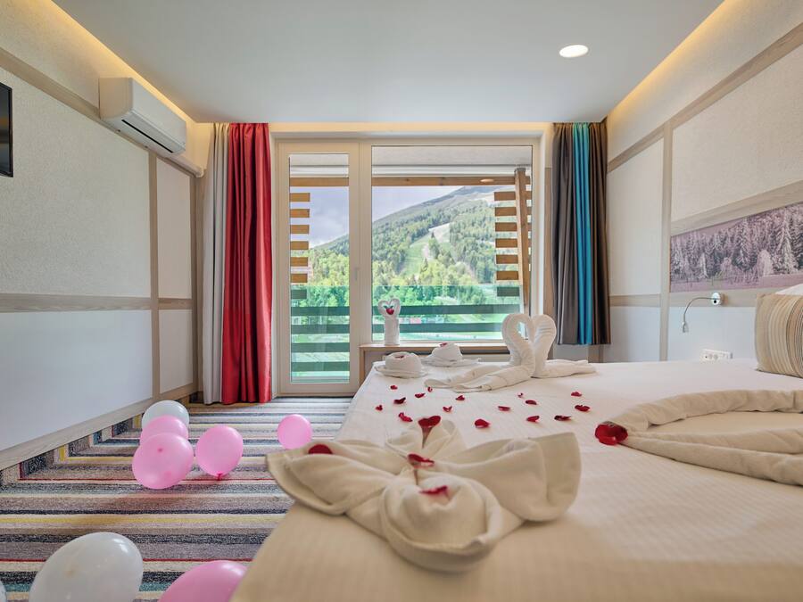 Premium bedding, desk, laptop workspace, free WiFi