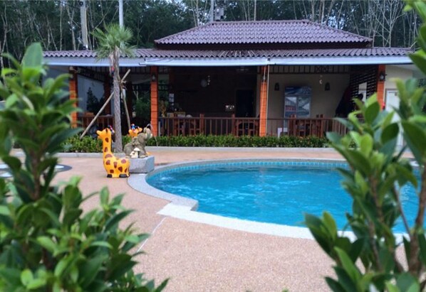 Outdoor pool, pool umbrellas, pool loungers