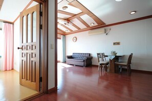 Family Double Room | Living area | TV