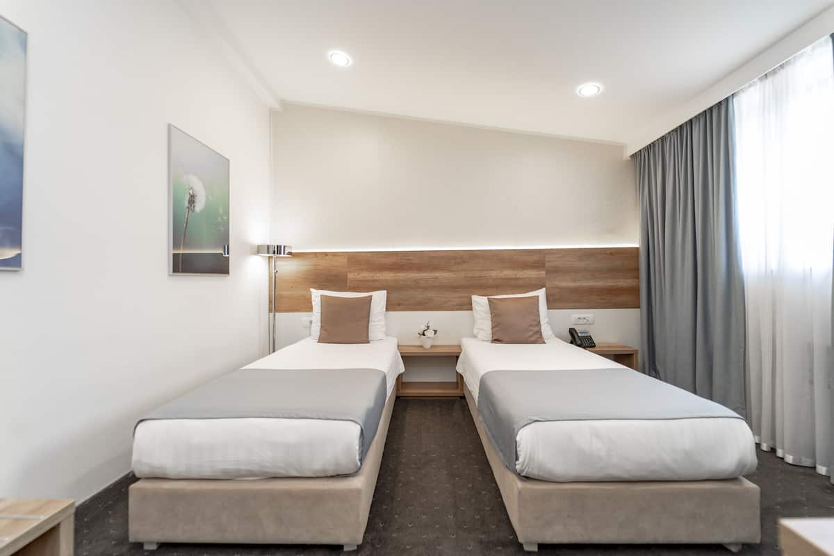 Superior Twin kamer, 1 slaapkamer | 1 slaapkamer, een minibar, een kluis op de kamer, een bureau