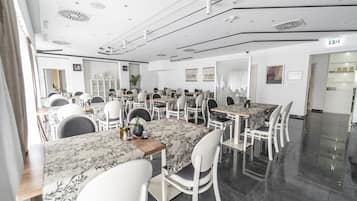 Breakfast, lunch, dinner served; local and international cuisine