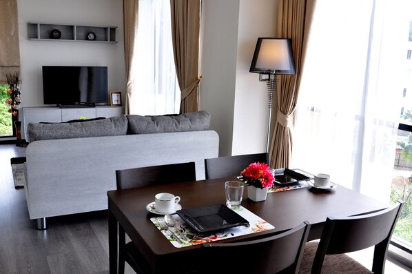 42-inch flat-screen TV with cable channels, TV