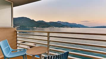 Family Room, Partial Ocean View | Terrace/patio