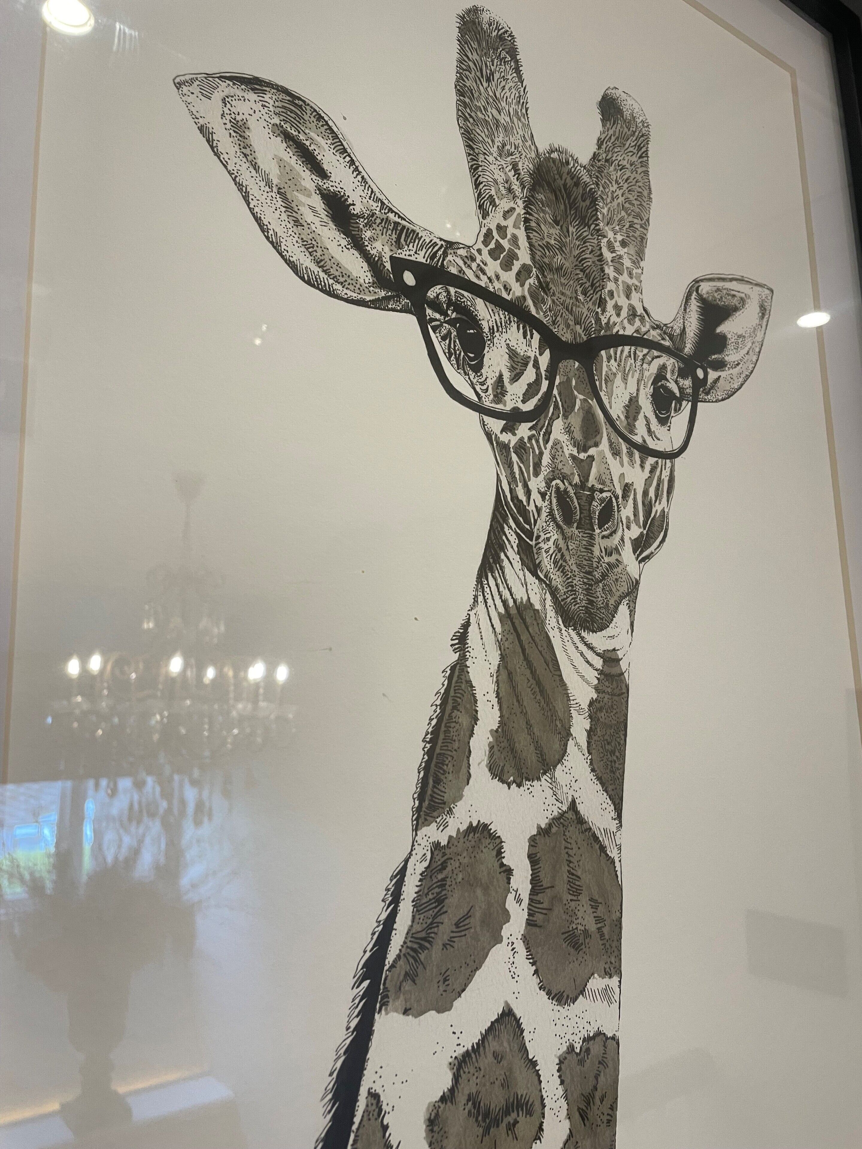 A giraffe with glasses.