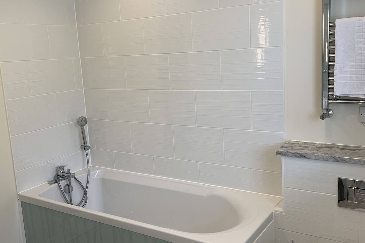 deluxe double room | bathroom | free toiletries, hair dryer, towels