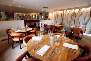 Breakfast, lunch, dinner served; local cuisine 