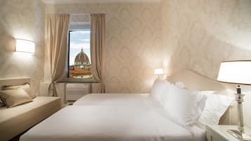 Ropa de cama de alta calidad, cubrecamas y minibar