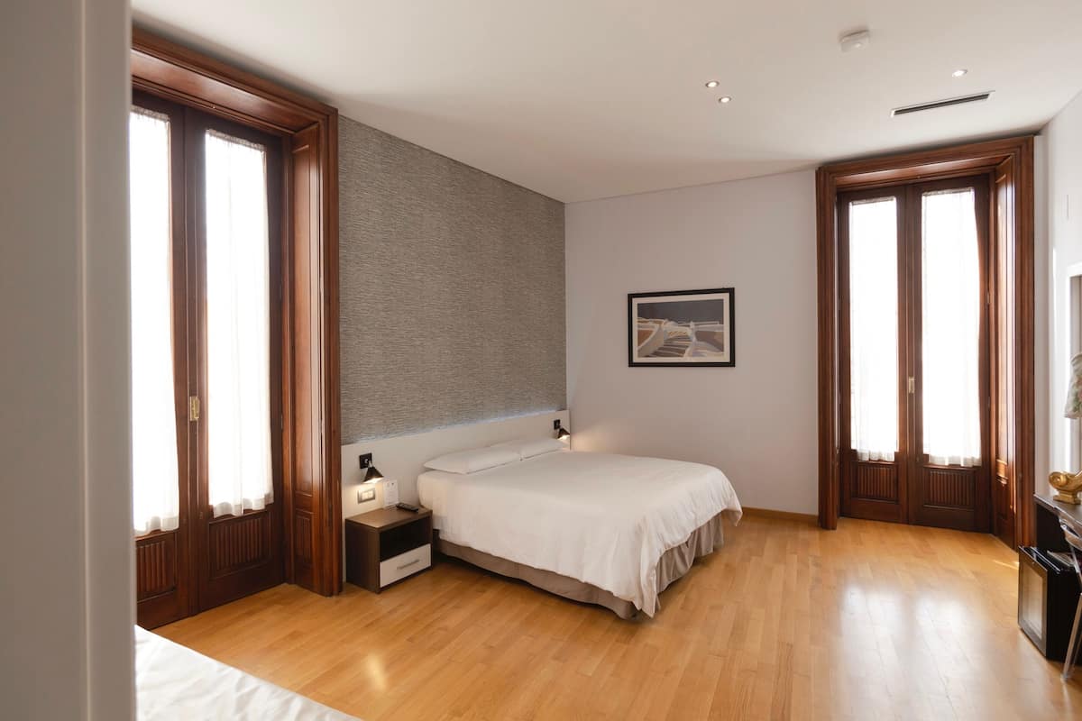Deluxe Quadruple Room, 1 Double Bed | 1 bedroom, premium bedding, down duvets, minibar
