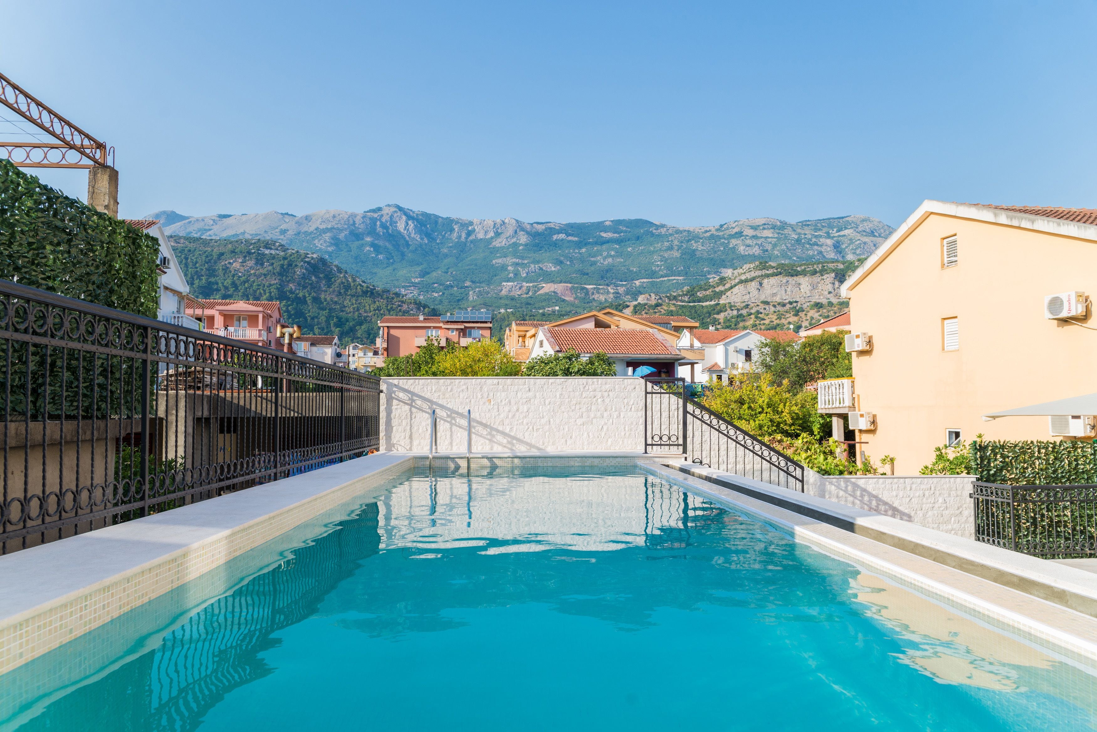 seasonal outdoor pool, open 10:00 am to 8:00 pm, pool umbrellas