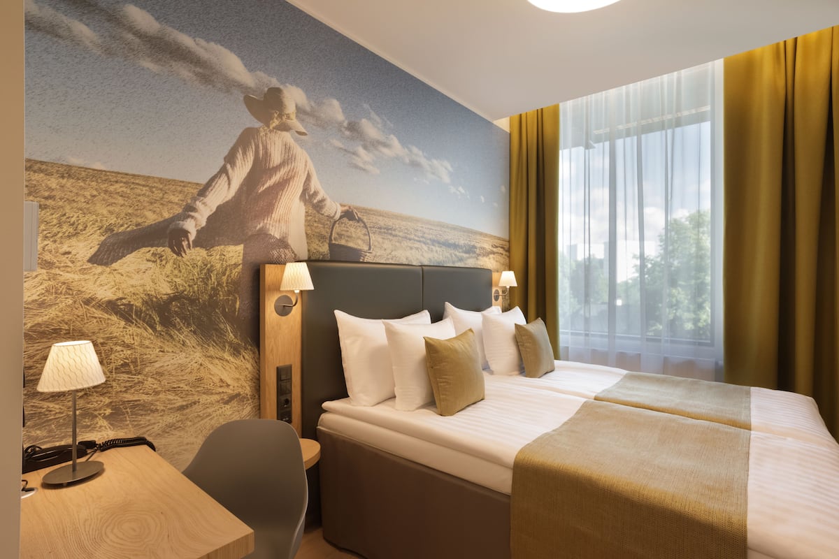 standard double or twin room | in-room safe, desk, iron/ironing board, free wifi