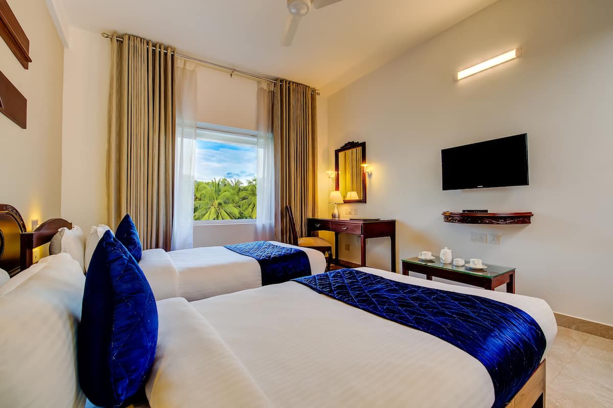 Chambre Double Deluxe, 1 grand lit, salle de bains attenante, vue ville | Vue sur la ville