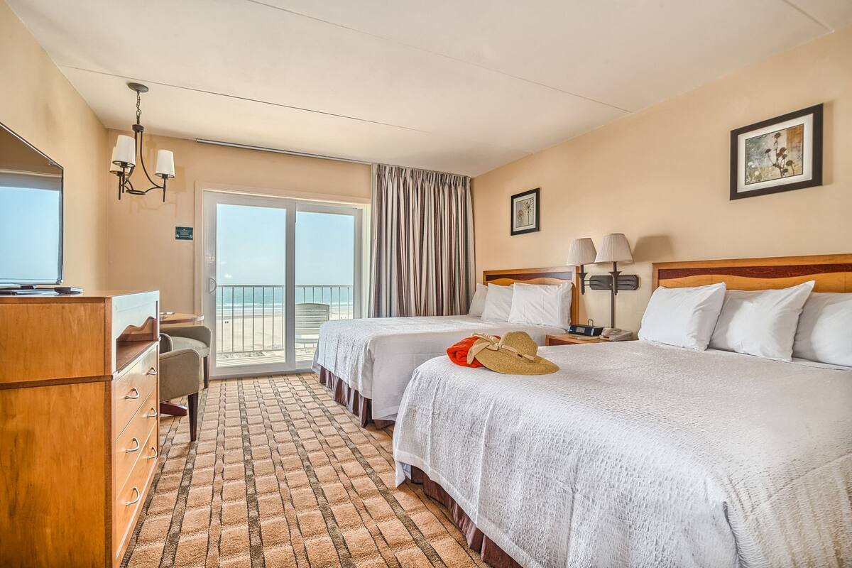 basic room, 2 queen beds, ocean view | in-room safe, desk, iron/ironing board, free wifi