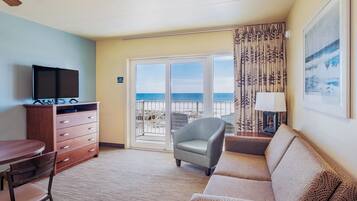 Classic Room, Multiple Beds, Kitchenette, Ocean View | Living area | Flat-screen TV, DVD player