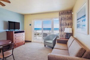Classic Room, Multiple Beds, Kitchenette, Ocean View | Living area | Flat-screen TV, DVD player