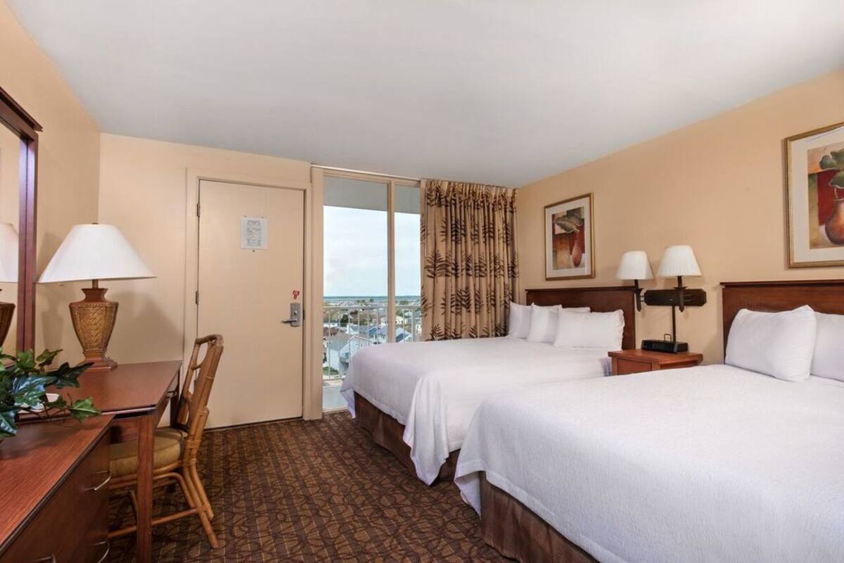 classic room, multiple beds, kitchenette, ocean view | in-room safe, desk, iron/ironing board, free wifi