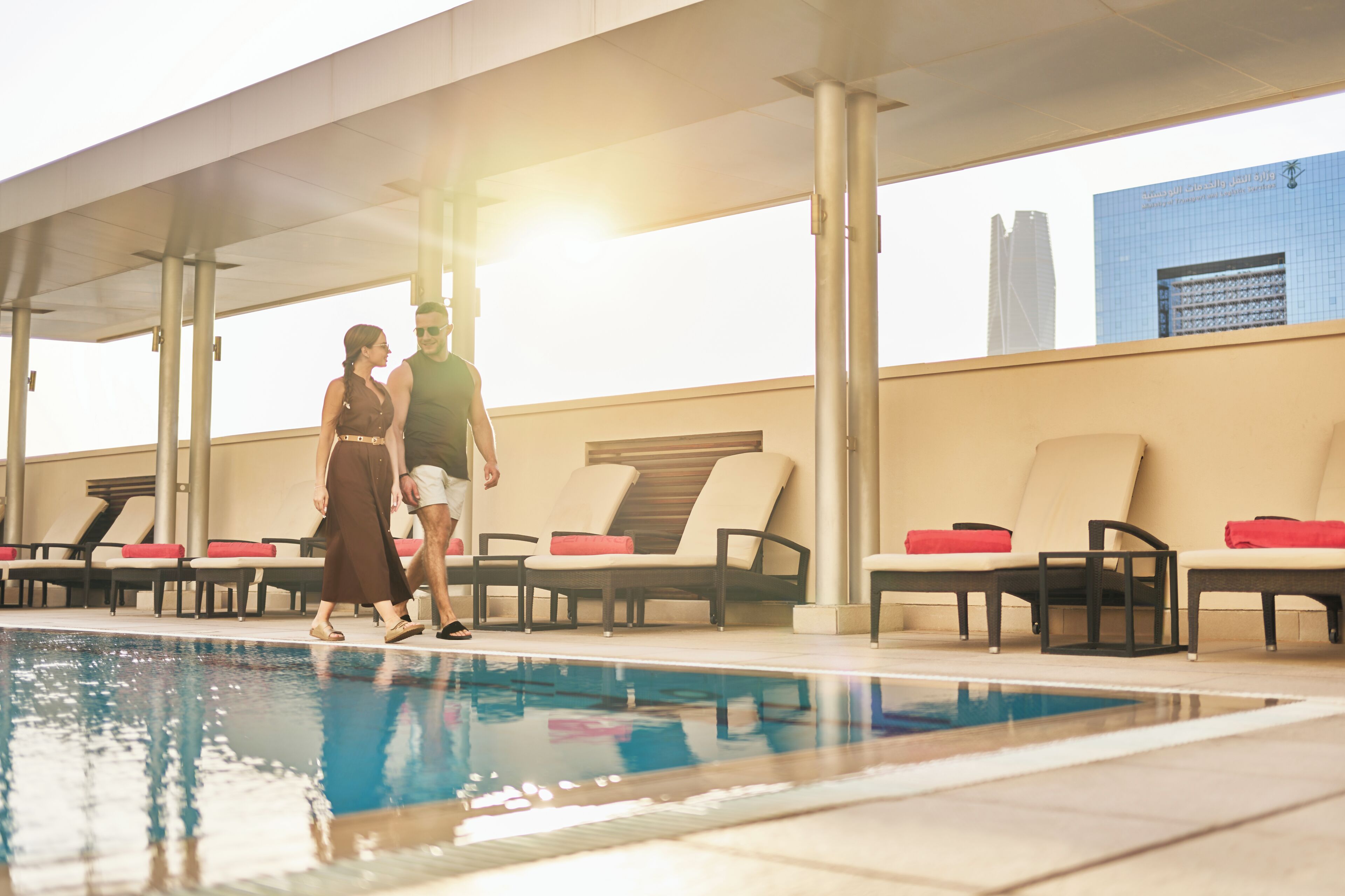 Outdoor pool, open 6:00 AM to 10:30 PM, pool umbrellas, sun loungers