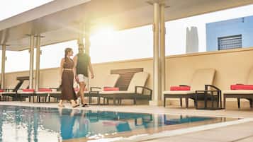 Outdoor pool, open 6:00 AM to 10:30 PM, pool umbrellas, sun loungers