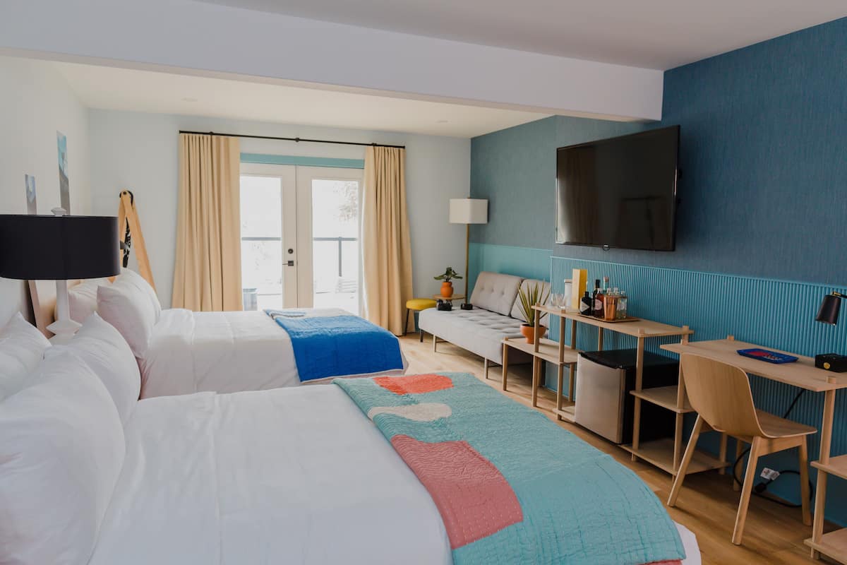 the flat at drake motor inn | premium bedding, minibar, in-room safe, individually decorated