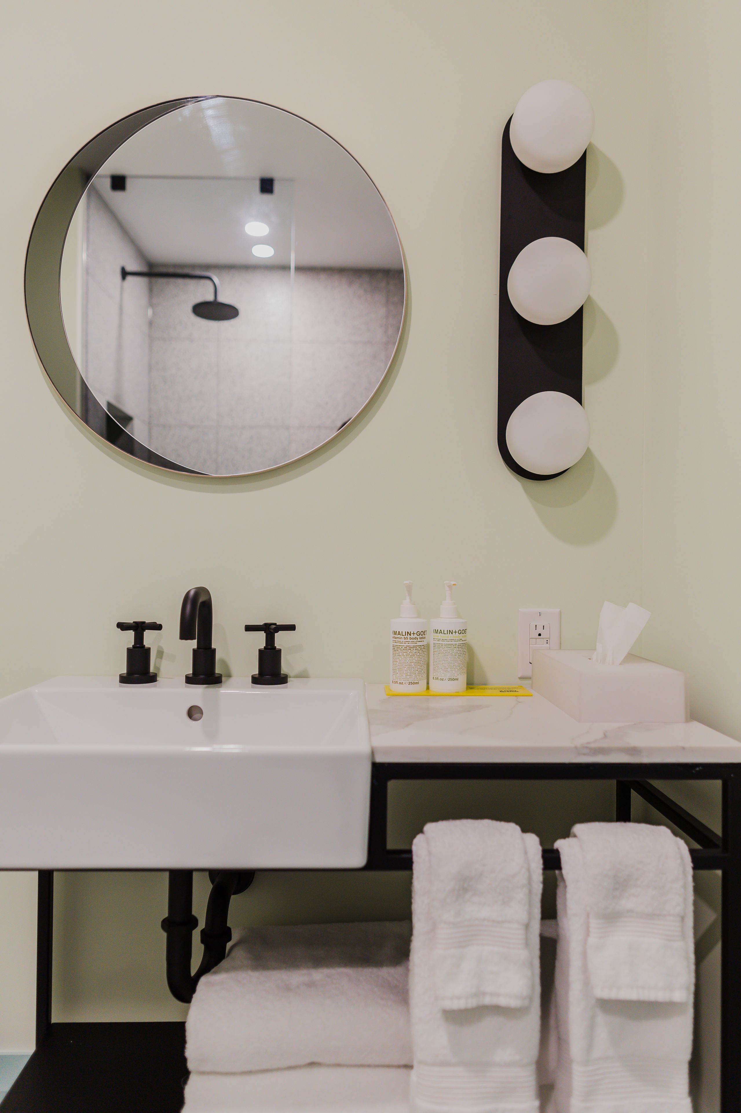 double queen at drake motor inn | bathroom | shower, rainfall showerhead, free toiletries, hair dryer